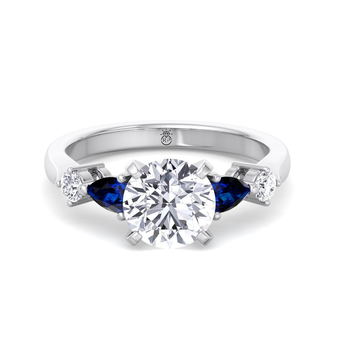 Round Cut Engagement Ring with Blue Sapphire Pear Shape Sidestones
