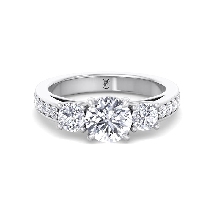 Round Cut Engagement Ring With Sidestones