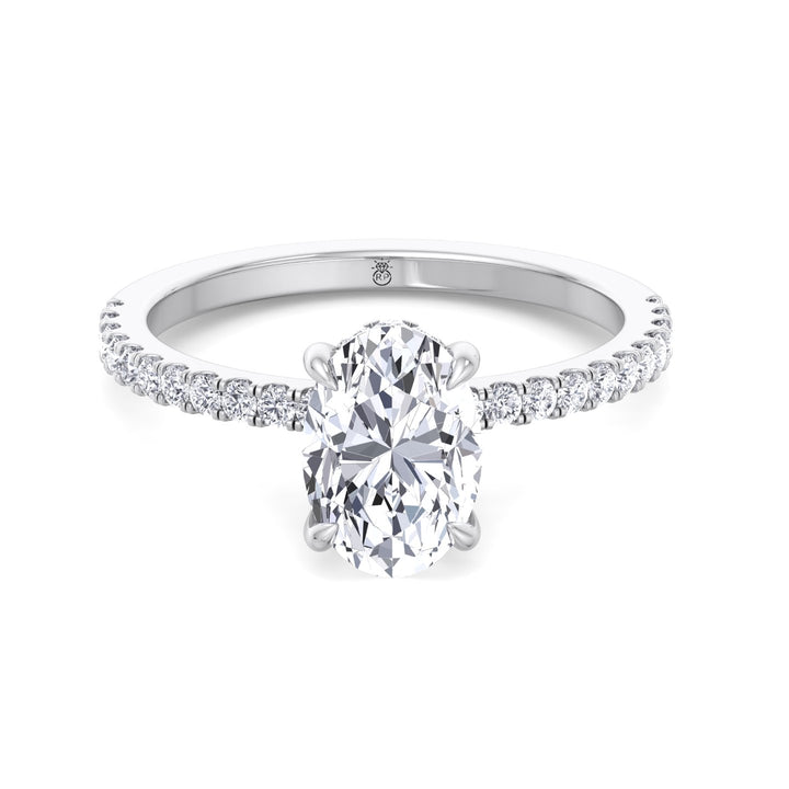 Oval Cut Invisible Halo Engagement Ring with Sidestones