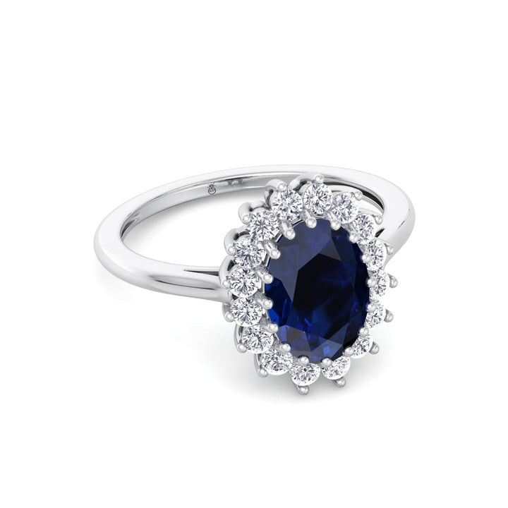 Oval Cut Blue Sapphire &amp; Halo Engagement Ring