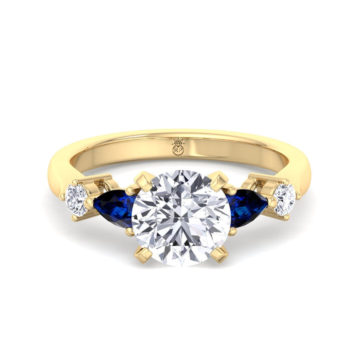 Round Cut Engagement Ring with Blue Sapphire Pear Shape Sidestones