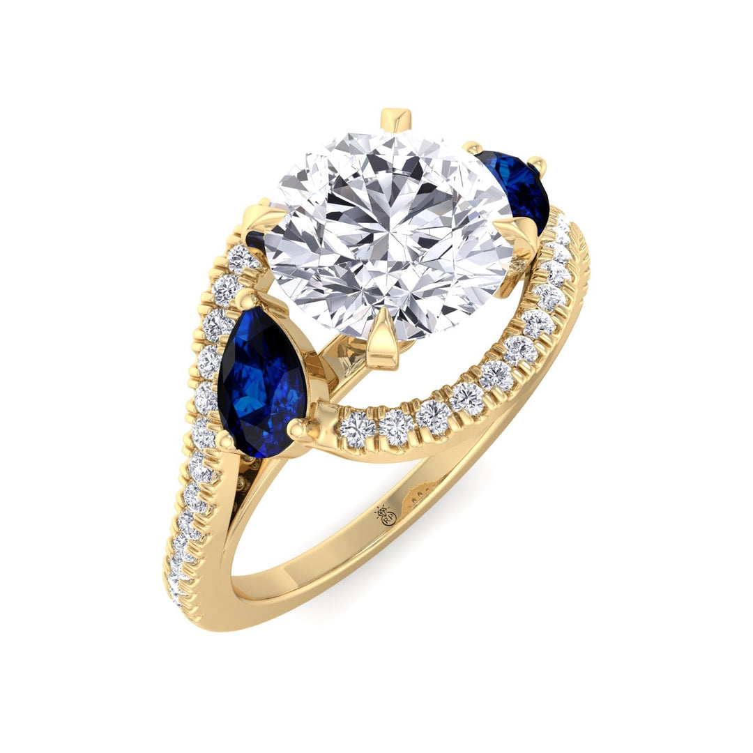 Round Cut Engagement Ring with Halo &amp; Blue Sapphire Pear Shape Sidestones