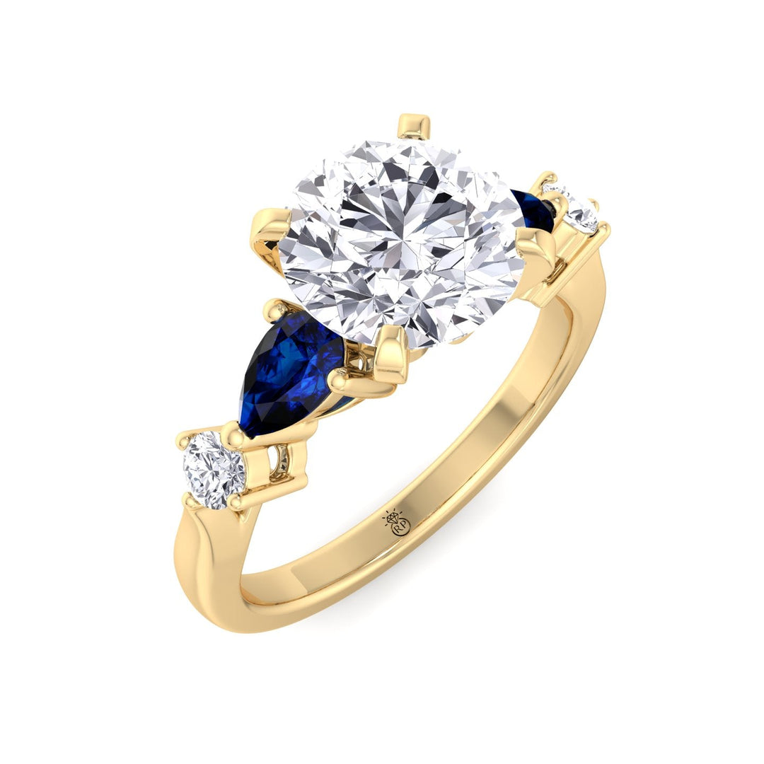 Round Cut Engagement Ring with Blue Sapphire Pear Shape Sidestones