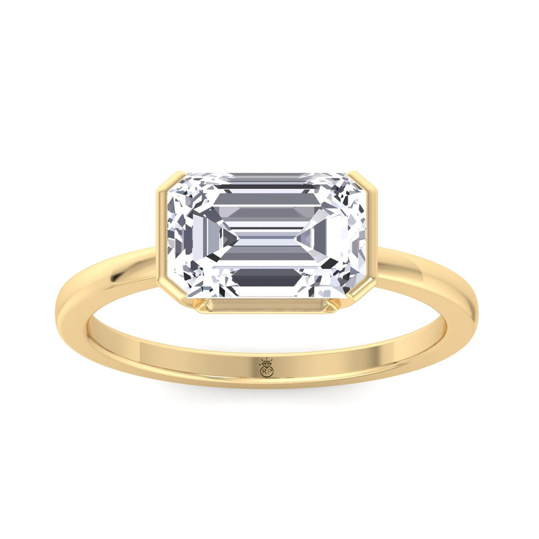 Bezel Set Emerald Cut Engagement Ring East to West