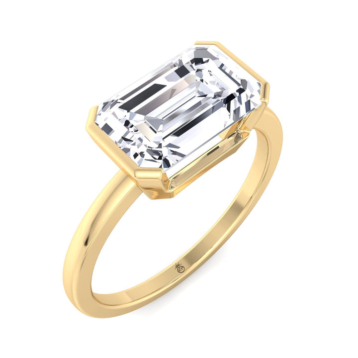 Bezel Set Emerald Cut Engagement Ring East to West