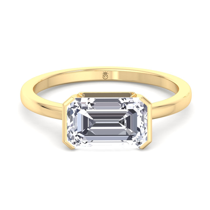 Bezel Set Emerald Cut Engagement Ring East to West