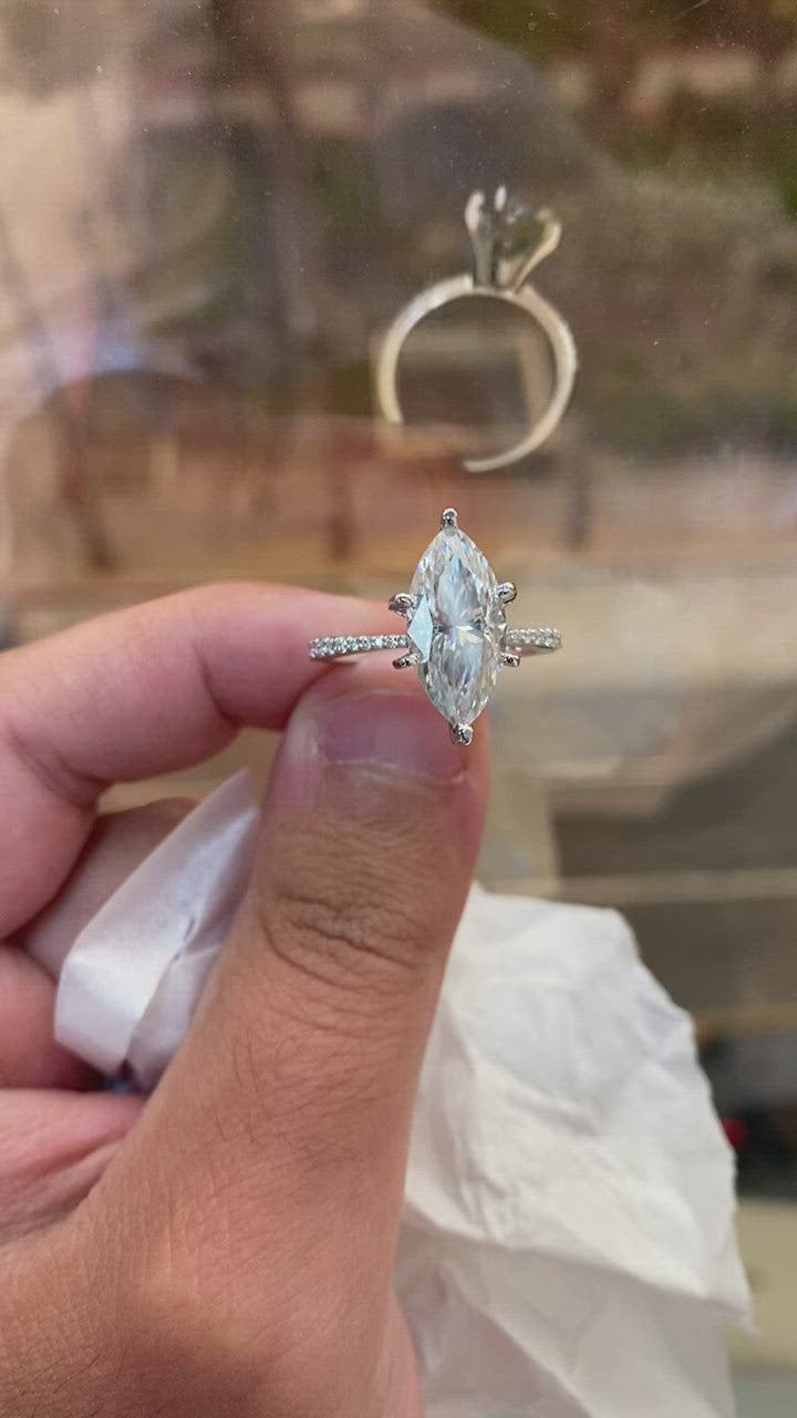 Marquise Cut Engagement Ring with Sidestones